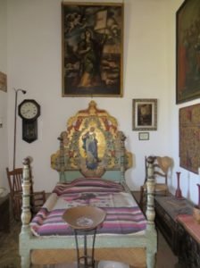 ornate bed at San Gabriel Mission museum