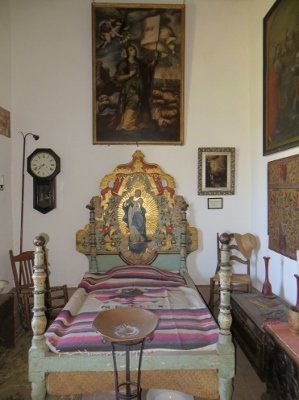 ornate bed at San Gabriel Mission museum