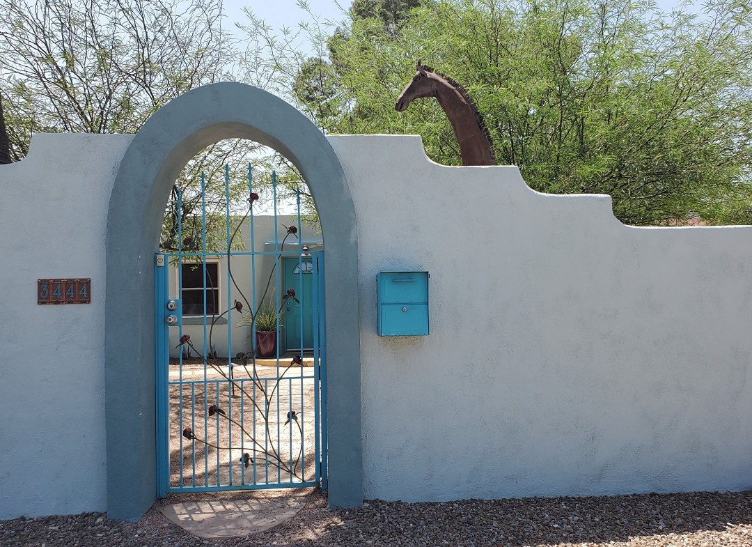 garden gate with giraffe